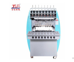 China Decorative Pvc Clothing Label Dropping Machine