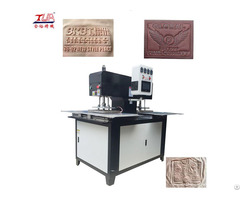 China Dongguan Jinyu Silicone Label Logo Moulding Machine Onto Garment