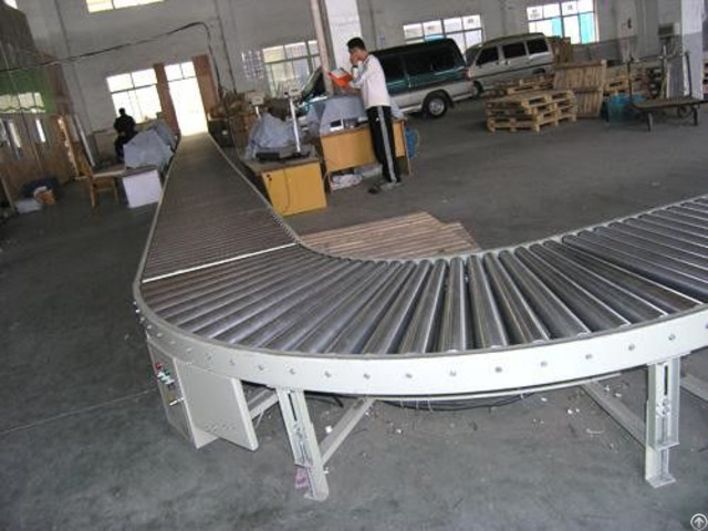 China High Quality Stainless Steel Turning Drum Conveyor Manufacture