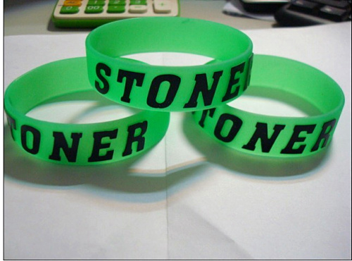 Green Background With Black Logo Silicone Wristband